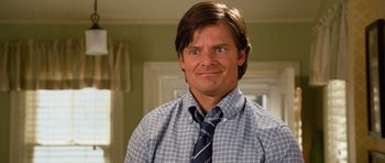 Movie still from “Diary of a Wimpy Kid: Dog Days” (2012), directed by David Bowers – A person wearing a shirt and a tie; Close Up shot, Over the shoulder angle