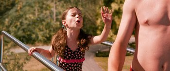 Movie still from “Diary of a Wimpy Kid: Dog Days” (2012), directed by David Bowers – A little girl with her mouth wide open; Medium shot, High angle
