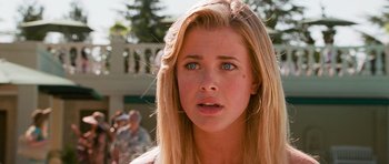 Movie still from “Diary of a Wimpy Kid: Dog Days” (2012), directed by David Bowers – A person with long blonde hair; Close Up shot, Over the shoulder angle