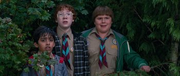 Movie still from “Diary of a Wimpy Kid: Dog Days” (2012), directed by David Bowers – A group of young men standing next to each other; Medium shot, Low angle