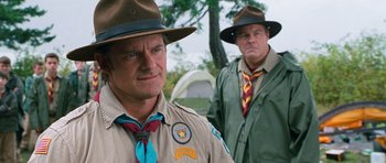 Movie still from “Diary of a Wimpy Kid: Dog Days” (2012), directed by David Bowers – A couple of men standing next to each other wearing hats; Close Up shot, Over the shoulder angle