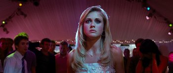 Movie still from “Diary of a Wimpy Kid: Dog Days” (2012), directed by David Bowers – A beautiful blonde woman in a white dress; Close Up shot, Low angle