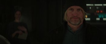 Movie still from “The Hunger Games: Mockingjay - Part 1” (2014), directed by Francis Lawrence – A person wearing a jacket; Close Up shot, Over the shoulder angle