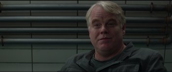 Movie still from “The Hunger Games: Mockingjay - Part 1” (2014), directed by Francis Lawrence – A person wearing a jacket; Close Up shot, Over the shoulder angle