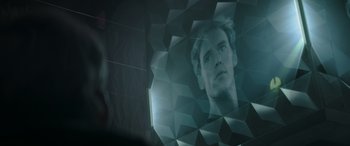 Movie still from “The Hunger Games: Mockingjay - Part 2” (2015), directed by Francis Lawrence – A man's face is reflected in a mirror; Close Up shot, Overhead angle