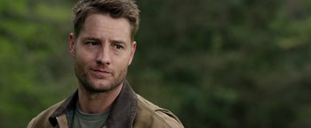 Movie still from “The Hunt” (2020), directed by Craig Zobel – A person wearing a jacket; Close Up shot, Over the shoulder angle