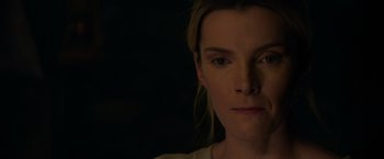 Movie still from “The Hunt” (2020), directed by Craig Zobel – A person's face in the dark; Close Up shot, Over the shoulder angle