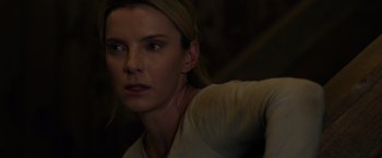 Movie still from “The Hunt” (2020), directed by Craig Zobel – A person wearing a white shirt; Close Up shot, Over the shoulder angle