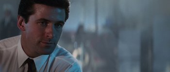 Movie still from “The Hunt for Red October” (1990), directed by John McTiernan – A person wearing a white shirt; Close Up shot, Over the shoulder angle