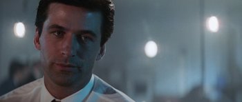 Movie still from “The Hunt for Red October” (1990), directed by John McTiernan – A person wearing a white dress shirt; Close Up shot, Low angle