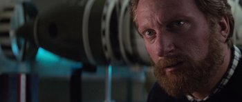 Movie still from “The Hunt for Red October” (1990), directed by John McTiernan – A person with a beard; Close Up shot, Over the shoulder angle