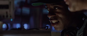 Movie still from “The Hunt for Red October” (1990), directed by John McTiernan – A man's face in a dark room; Close Up shot, Low angle