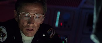 Movie still from “The Hunt for Red October” (1990), directed by John McTiernan – An older man wearing glasses and a uniform; Close Up shot, Low angle