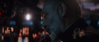 Movie still from “The Hunt for Red October” (1990), directed by John McTiernan – A person with a beard; Close Up shot, Low angle
