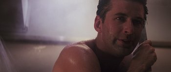 Movie still from “The Hunt for Red October” (1990), directed by John McTiernan – A man's chest and shoulders; Close Up shot, Low angle