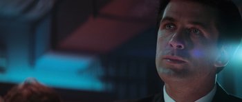 Movie still from “The Hunt for Red October” (1990), directed by John McTiernan – A person wearing a suit and tie; Close Up shot, Low angle