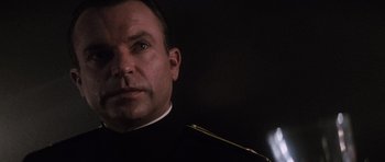 Movie still from “The Hunt for Red October” (1990), directed by John McTiernan – A person wearing a military uniform; Close Up shot, Low angle