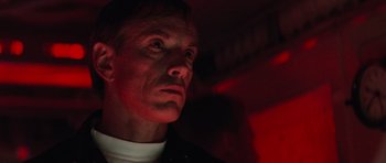 Movie still from “The Hunt for Red October” (1990), directed by John McTiernan – A person looking up at the ceiling; Close Up shot, Low angle