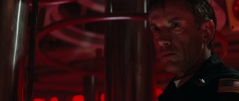 Movie still from “The Hunt for Red October” (1990), directed by John McTiernan – A person in a dark room; Close Up shot, Low angle