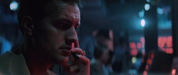 Movie still from “The Hunt for Red October” (1990), directed by John McTiernan – A person smoking a cigarette; Close Up shot, Low angle