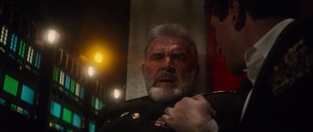 Movie still from “The Hunt for Red October” (1990), directed by John McTiernan – An old man with a gray beard wearing a military uniform; Close Up shot, Low angle