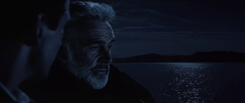 Movie still from “The Hunt for Red October” (1990), directed by John McTiernan – An old man with a beard is looking at the water; Close Up shot, Low angle