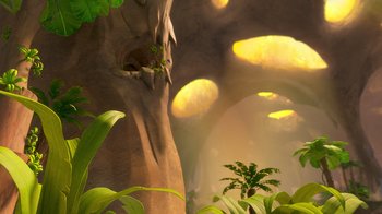 Movie still from “The Ice Age Adventures of Buck Wild” (2022), directed by John C. Donkin – A large tree with a bunch of green leaves around it; Extreme Wide shot, Low angle