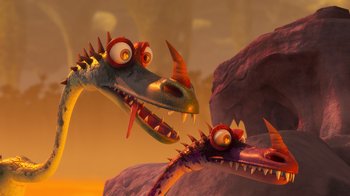 Movie still from “The Ice Age Adventures of Buck Wild” (2022), directed by John C. Donkin – A couple of cartoon dragons are sitting in a cave; Close Up shot, High angle