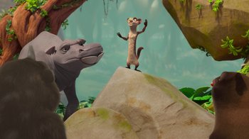 Movie still from “The Ice Age Adventures of Buck Wild” (2022), directed by John C. Donkin – An animal standing on top of a rock next to an elephant; Wide shot, Low angle