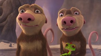 Movie still from “The Ice Age Adventures of Buck Wild” (2022), directed by John C. Donkin – A couple of monkeys standing next to each other on top of a hill; Close Up shot, Low angle