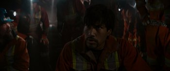 Movie still from “The Ice Road” (2021), directed by Jonathan Hensleigh – A person wearing a red and yellow jacket; Close Up shot, Over the shoulder angle