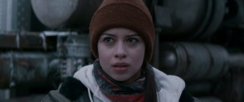 Movie still from “The Ice Road” (2021), directed by Jonathan Hensleigh – A person wearing a hat and a scarf; Close Up shot, Over the shoulder angle