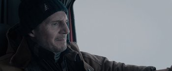 Movie still from “The Ice Road” (2021), directed by Jonathan Hensleigh – A person sitting in a car; Close Up shot, Over the shoulder angle