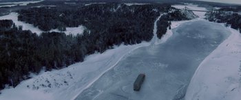 Movie still from “The Ice Road” (2021), directed by Jonathan Hensleigh – An aerial view of a truck in the middle of a snowy field; Extreme Wide shot, Overhead angle