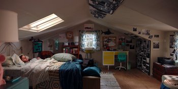 Movie still from “The In Between” (2022), directed by Arie Posin – A bedroom with a bed , desk , and a window; Extreme Wide shot, High angle