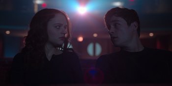 Movie still from “The In Between” (2022), directed by Arie Posin – A man and a woman staring at each other; Close Up shot, Low angle