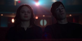 Movie still from “The In Between” (2022), directed by Arie Posin – A man and a woman standing next to each other; Close Up shot, Low angle