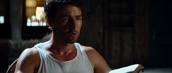 Movie still from “The Incredible Hulk” (2008), directed by Louis Leterrier – A person wearing a white shirt; Close Up shot, Over the shoulder angle