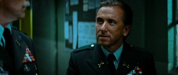 Movie still from “The Incredible Hulk” (2008), directed by Louis Leterrier – A person wearing a uniform; Close Up shot, Low angle