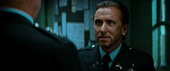 Movie still from “The Incredible Hulk” (2008), directed by Louis Leterrier – A person wearing a uniform; Close Up shot, Over the shoulder angle