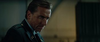 Movie still from “The Incredible Hulk” (2008), directed by Louis Leterrier – A person wearing a suit and tie; Close Up shot, Low angle