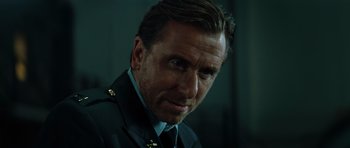 Movie still from “The Incredible Hulk” (2008), directed by Louis Leterrier – A person wearing a uniform; Close Up shot, Low angle