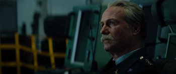 Movie still from “The Incredible Hulk” (2008), directed by Louis Leterrier – An older man with a mustache and a beard; Close Up shot, Low angle
