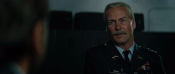 Movie still from “The Incredible Hulk” (2008), directed by Louis Leterrier – A person wearing a uniform; Close Up shot, Low angle