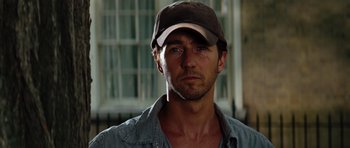 Movie still from “The Incredible Hulk” (2008), directed by Louis Leterrier – A person wearing a hat; Close Up shot, Low angle