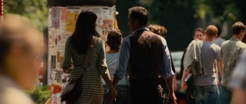 Movie still from “The Incredible Hulk” (2008), directed by Louis Leterrier – A man and a woman holding hands while standing next to each other; Medium shot, Over the shoulder angle