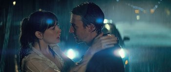 Movie still from “The Incredible Hulk” (2008), directed by Louis Leterrier – A man and a woman embracing in the rain; Close Up shot, Over the shoulder angle