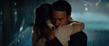 Movie still from “The Incredible Hulk” (2008), directed by Louis Leterrier – A man and a woman hugging each other in a room; Close Up shot, Over the shoulder angle