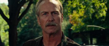 Movie still from “The Incredible Hulk” (2008), directed by Louis Leterrier – A person with a mustache; Close Up shot, Low angle