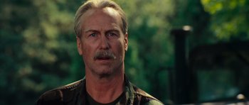 Movie still from “The Incredible Hulk” (2008), directed by Louis Leterrier – A person with a mustache; Close Up shot, Low angle